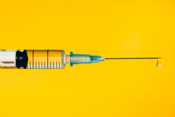 Modern syringe with liquid drug. The most anticipated procedure of the year