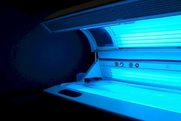 Gen Z Is Bringing Back Tanning Beds—What Derms Say