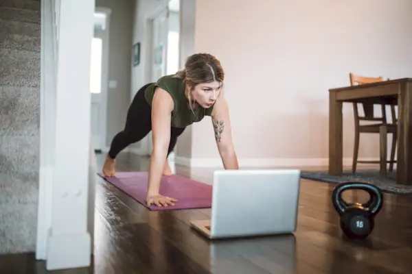 Woman Watching Exercise Tutorials Online