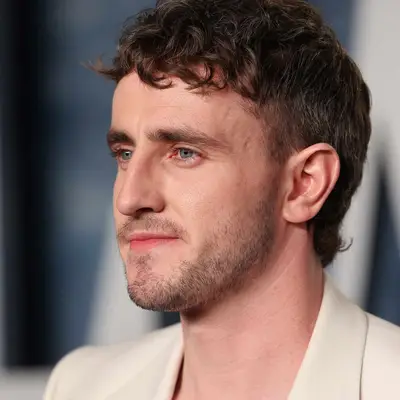 Actor Paul Mescal with a fade haircut, curly at the top of his crown
