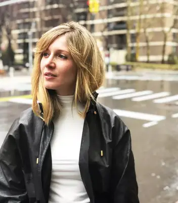 Woman in street with bangs