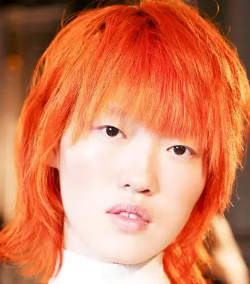 woman with dyed orange hair