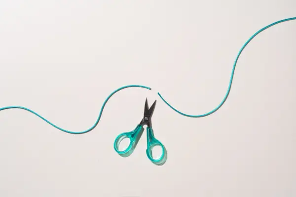 Scissors Cut a Rising Curve of Rope
