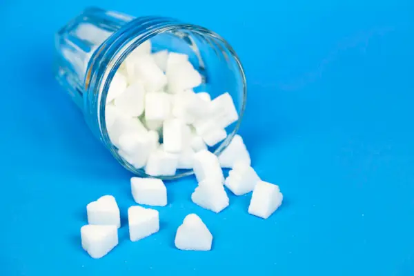 Glass with sugar cubes