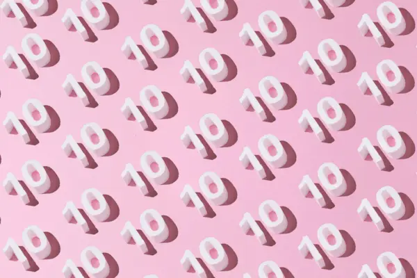 White diagonal pattern 10 on pink background. 10th anniversary concept
