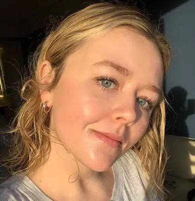 Author Holly Rhue after a lash perm with mascara on