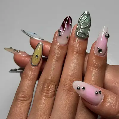 A mismatched manicure with builder gel accents