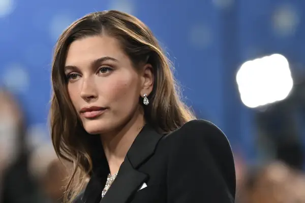 Hailey Bieber wearing a side-parted blowout at the 2025 Met Gala