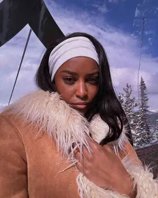 Ciara Miller wearing a fluffy jacket