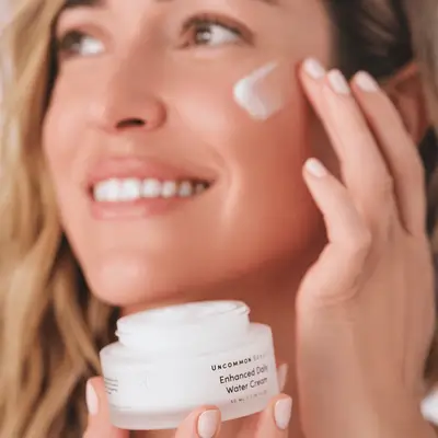 Kristin Cavallari applying moisturizer