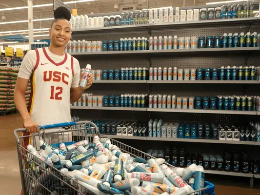 JuJu Watkins holding Degree Whole Body Deodorant