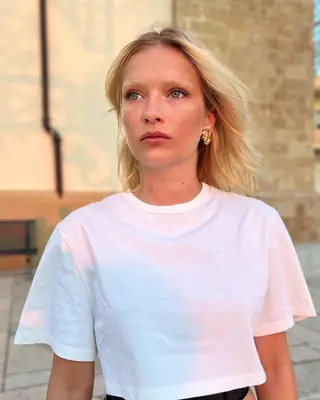 Close up of Camille Razat with bleached brows