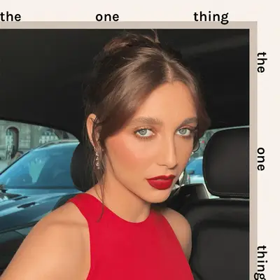 Emma Chamberlain in a garden