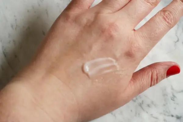 Alastin Restorative Skin Complex on the back of a person