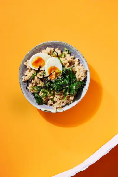 savory oatmeal with greens and eggs