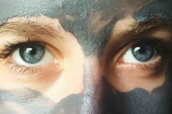 Woman face wearing clay facemaks