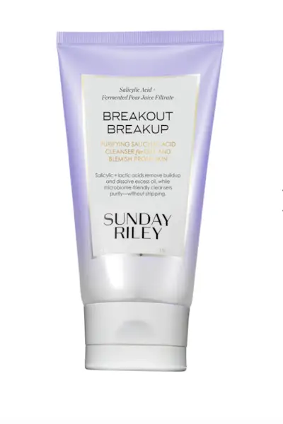 Many glass pipettes spilling drops of different moisturizing lotions on luxury silver background. Polyglutamic acid is new hyaluronic acid. Macro photography