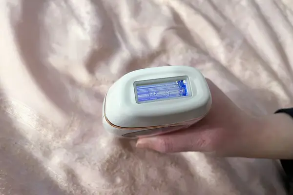 Closeup of hand holding nood The Flasher 2.0