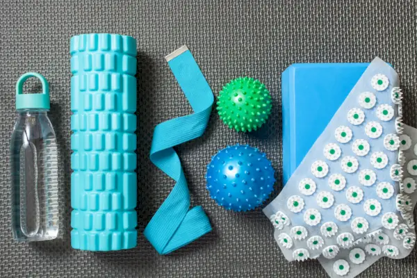 Fitness or yoga background. Equipment for home training. Top view. Flat lay. Knolling