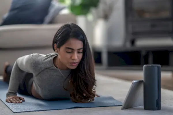 Middle Eastern Woman Doing a Workout at Home