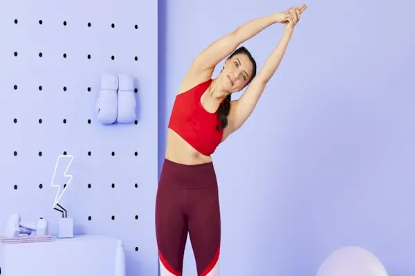 yoga teacher Suki Clements doing side bends