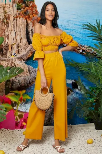 woman practicing yoga at home