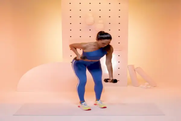 Close up of woman back with flexing her muscles