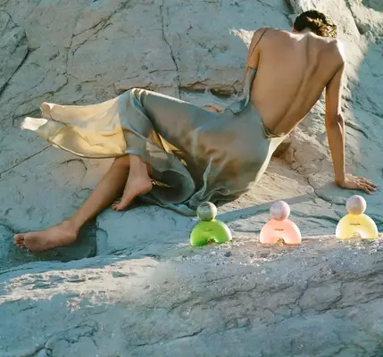 model with a Cult Gaia fragrance