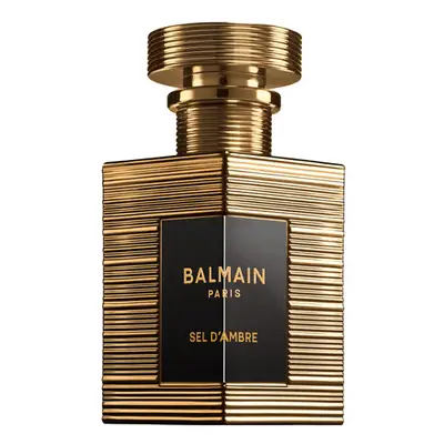 Gold ribbed square Balmain perfume bottle