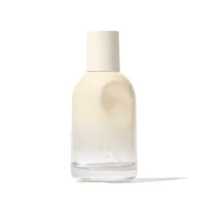 Cream Glossier perfume bottle