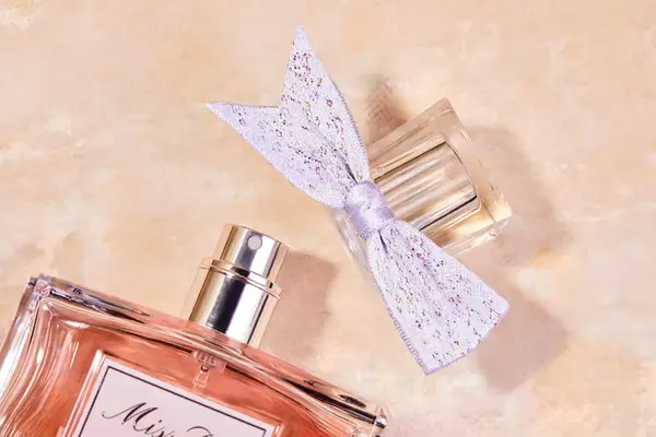 A bottle of DIOR Miss Dior Eau de Parfum with the cap off