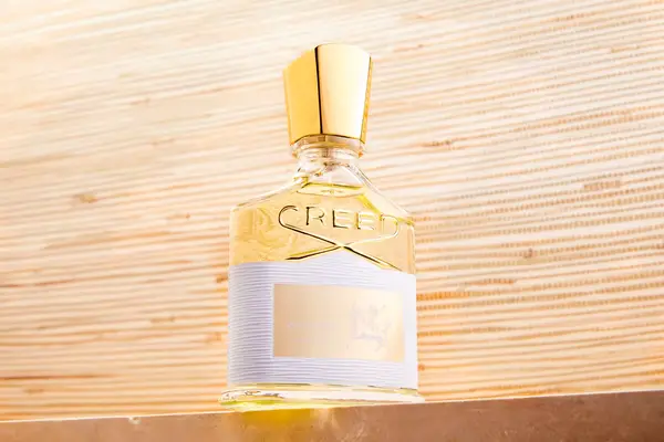 A bottle of Creed Aventus for Her