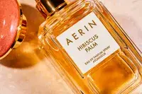 A closeup of the AERIN Hibiscus Palm Eau de Parfum label
