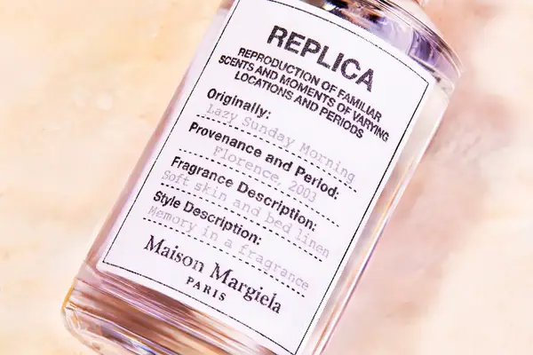 The label on a bottle of Maison Margiela Replica Lazy Sunday Morning Perfume
