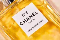 A closeup of the label on a bottle of Chanel No. 5 Eau de Parfum
