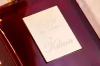 The label on a bottle of Killian Paris Rolling In Love