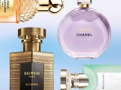 Various perfume bottles, including Chanel and Balmain