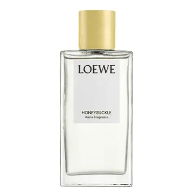 Loewe Honeysuckle room spray glass bottle with yellow cap.