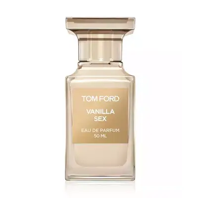 Tom Ford perfume in gold bottle with gold label