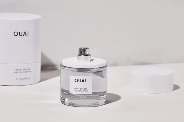 Ouai Dean St. Eau de Parfum on a white table