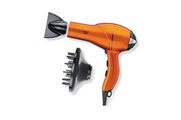 An orange Conair InfinitiPro Hair Dryer with diffuser and frizz-fighting attachment