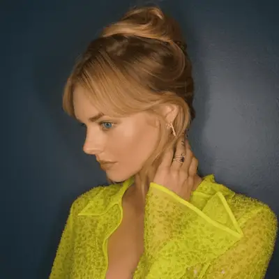 samara weaving wearing tousled updo
