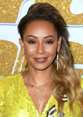 Mel B. with an asymmetrical mullet haircut