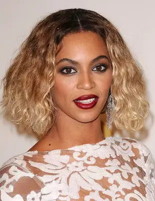 Beyoncé with a blonde ombre asymmetrical haircut