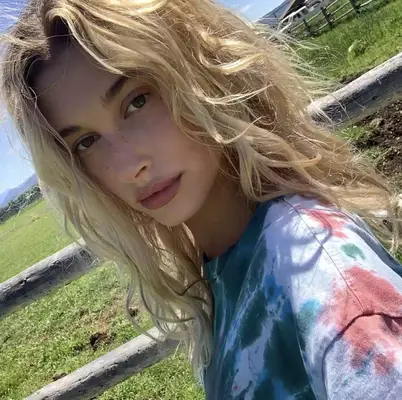 Hailey Bieber gets an effortless wavy texture using this old school hair hack.