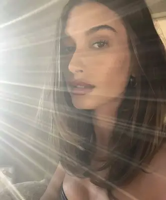 Hailey Bieber with a bouncy straight blowout