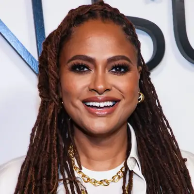 Ava DuVernay wears waist-length, auburn locs