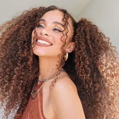 Joyjah Estrada wears waist-length curly high pigtails