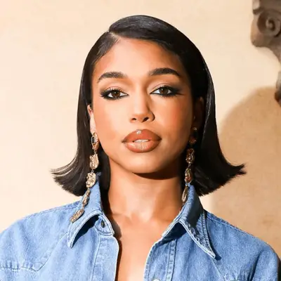 America Ferrera attends the 81st Annual Golden Globe Awards in a deep side part flipped bob and natural makeup