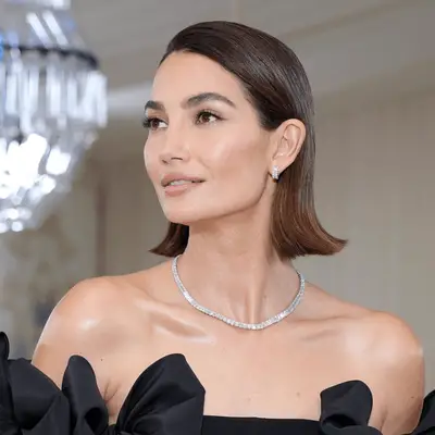 Florence Pugh attends the British Independent Film Awards in a slick gelled bob structured into flips and waves